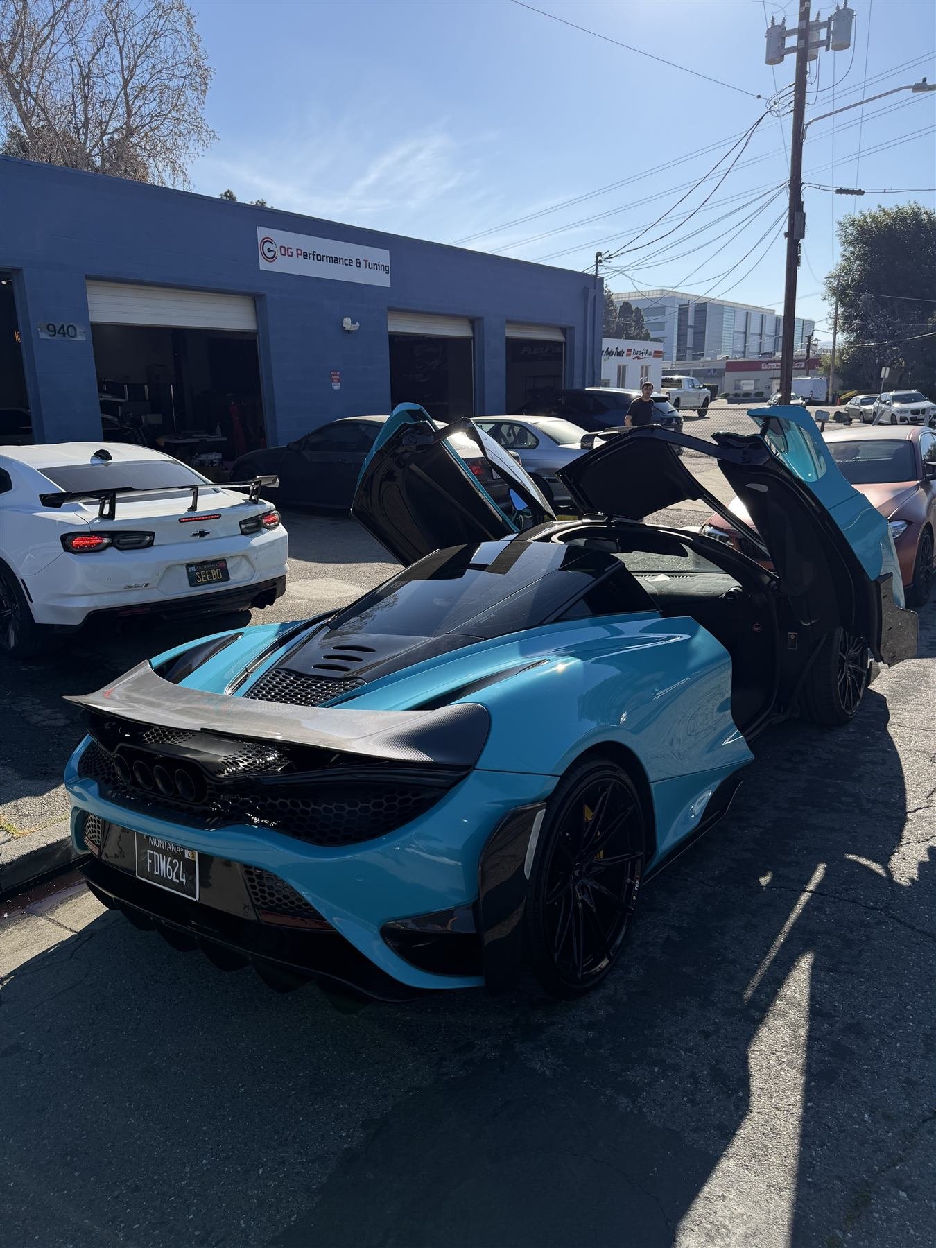 Blue exotic vehicle outside OG Performance and Tuning